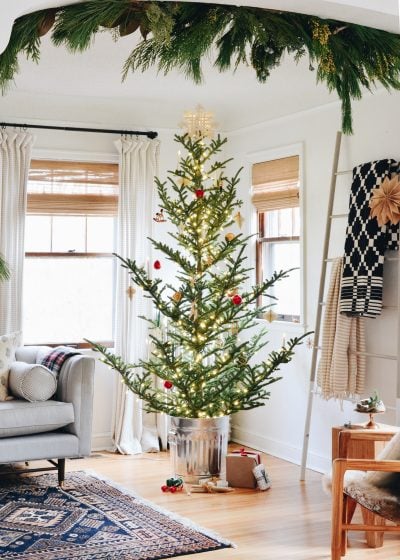 Christmas tree in a galvanized steel can decorating a home