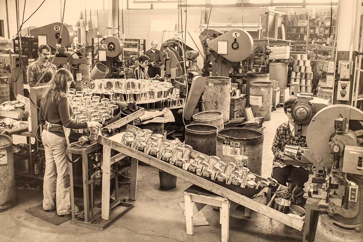 vintage image of workers on the galvanized steel product assembly line